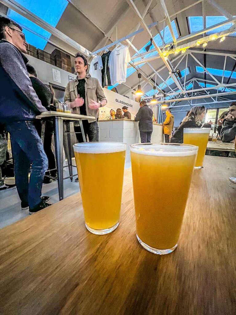 three pints of beer on the table at the Glasshouse in Birmingham