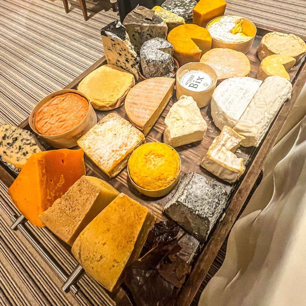 A huge cheese board of many different cheese varieties at Le-Champignon Sauvage, Cheltenham