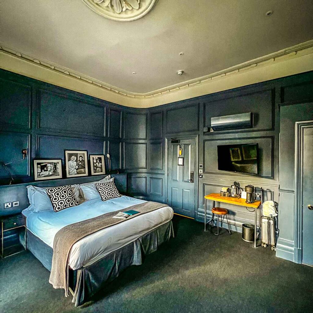 A bedroom at The George Hotel in Cheltenham.