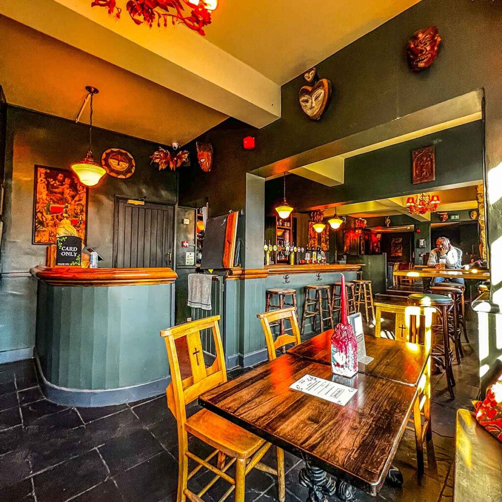 Interior bar and table of the Vine Pub in Cheltenham