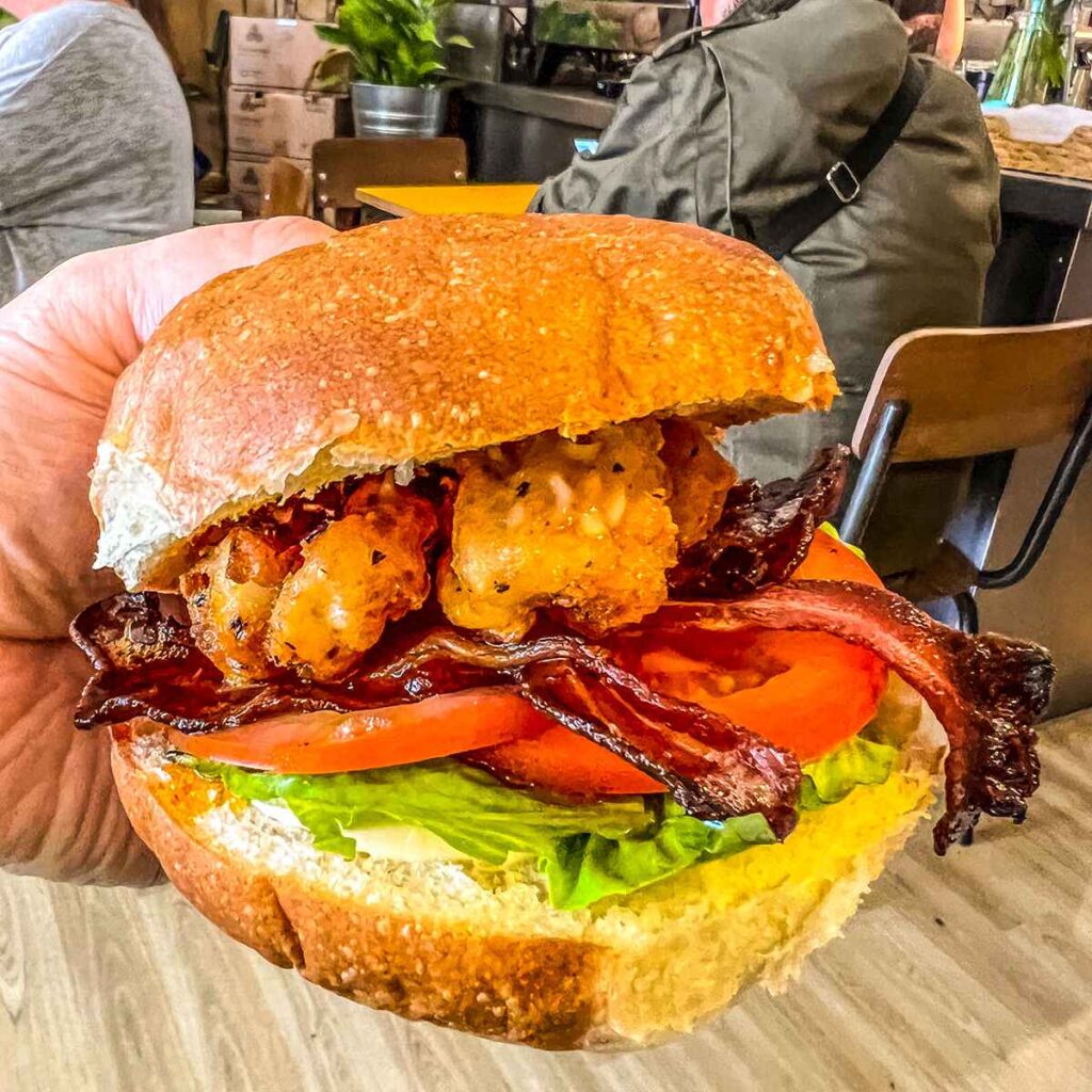 Caneat brunch burger with tomato and lettuce