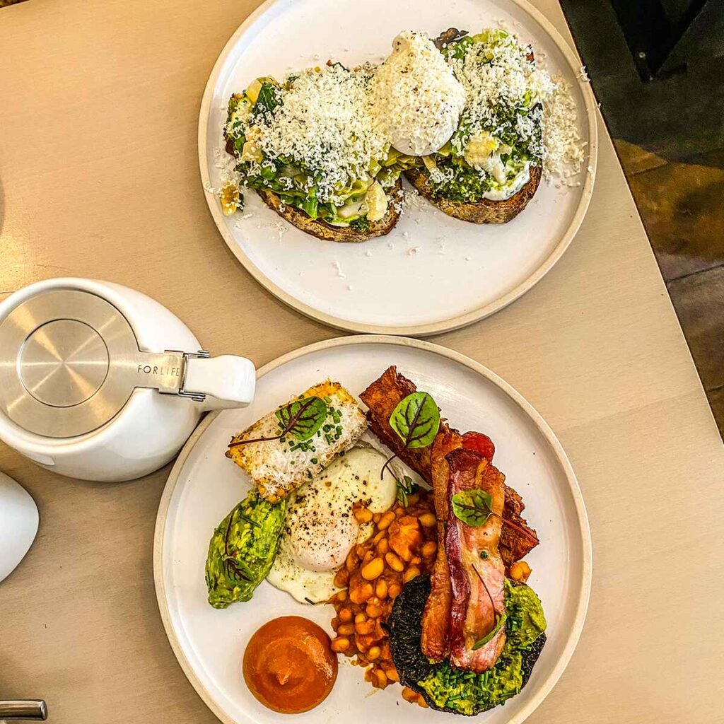 Two plates of brunch items from The Early Bird Bakery