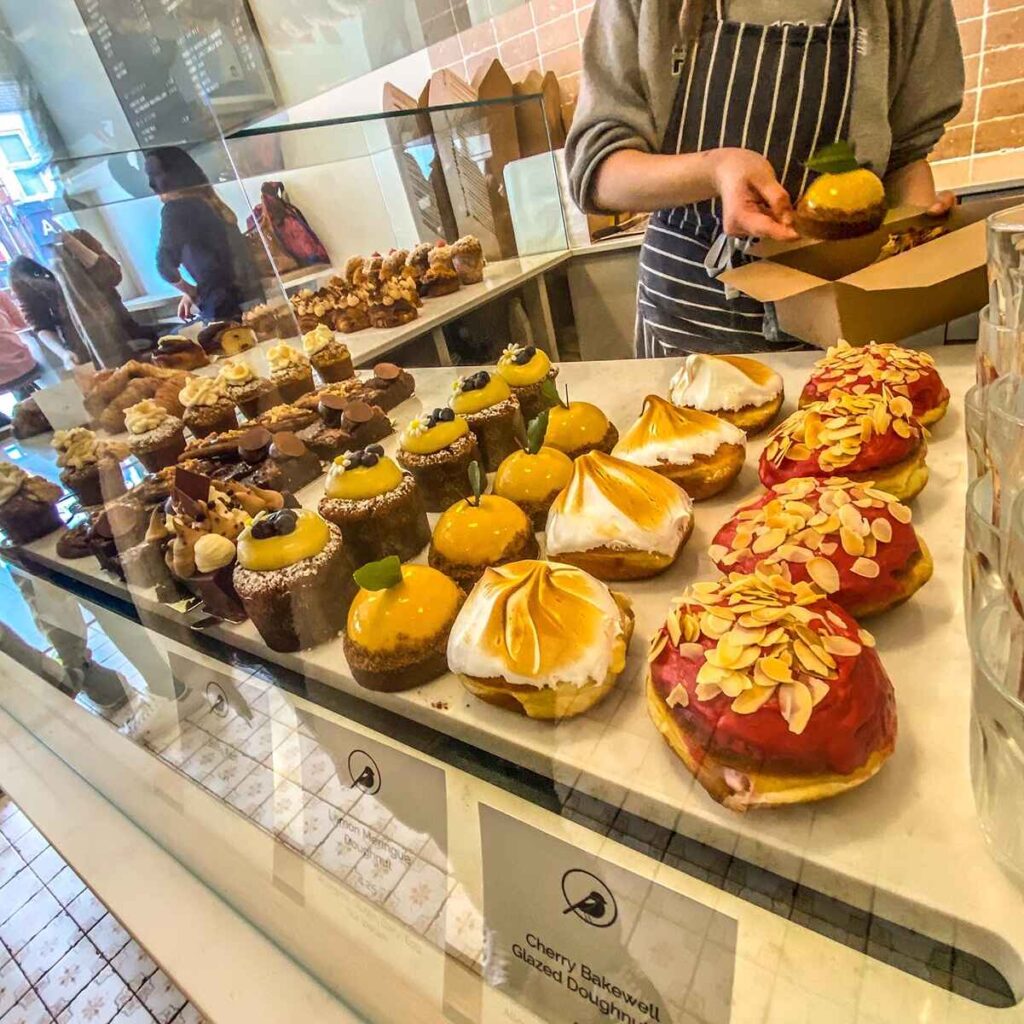 Glass display of brunch pastries at Early Bird Bakery