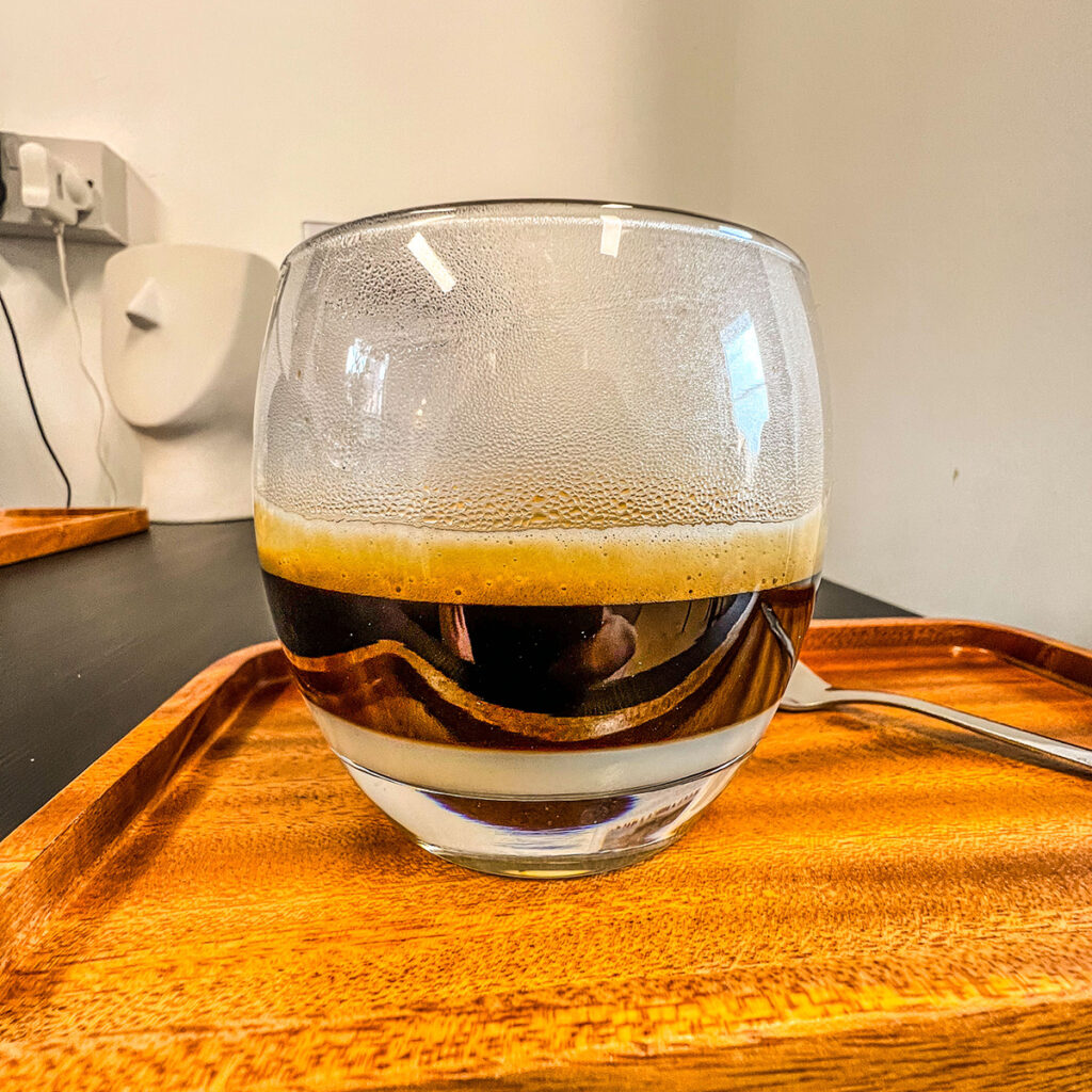 A coffee in a glass mug at Tranquil