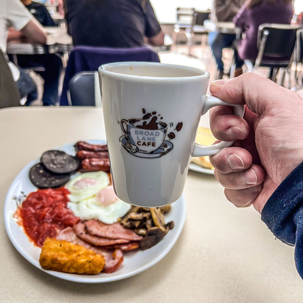 A full fry-up with branded mug of tea at Broad Lane Cafe.

