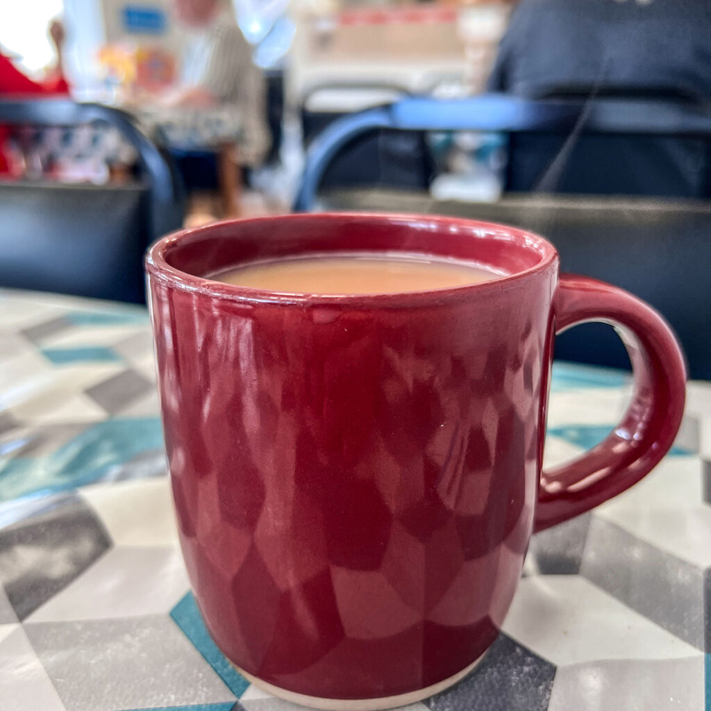 A red mug of tea at Tyseley Corner Cafe