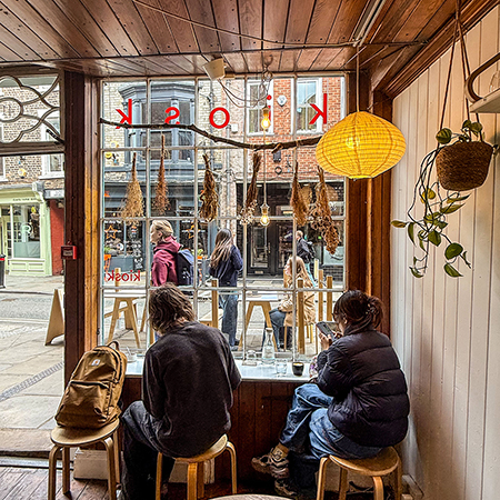 Some people watching the world go by at Kiosk, York.