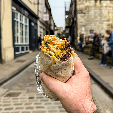 Eating my burrito exploring The Shambles.